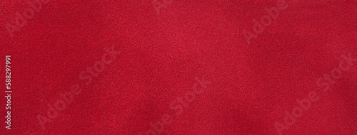 Texture of dark red velvet matte background, macro. Suede ruby fabric with pattern. Seamless wine textile