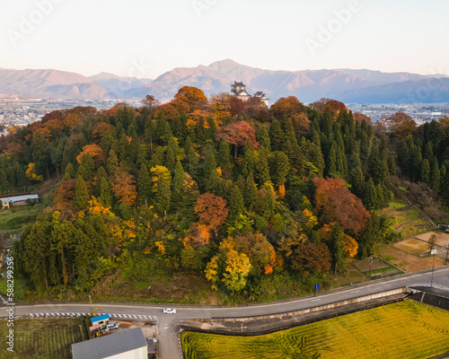 Aerial view of the Echizen-Ono.Castle at sunset during the koyo season, Fukui, Japan.
