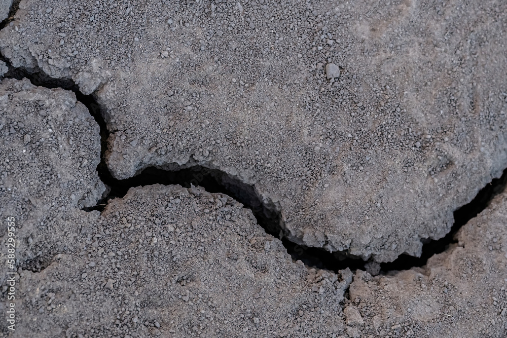 © Westend61 - Crack on dry drought land