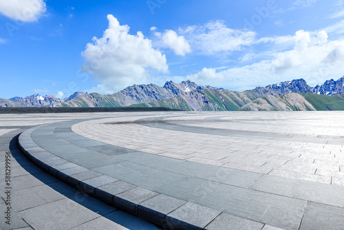 Empty square floor and mountain background © ABCDstock