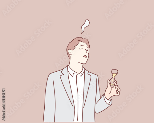 Businessman in a suit holding hourglass. Hand drawn style vector design illustrations.