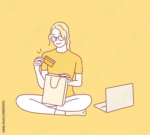 Woman shopping online on laptop. Hand drawn style vector design illustrations.