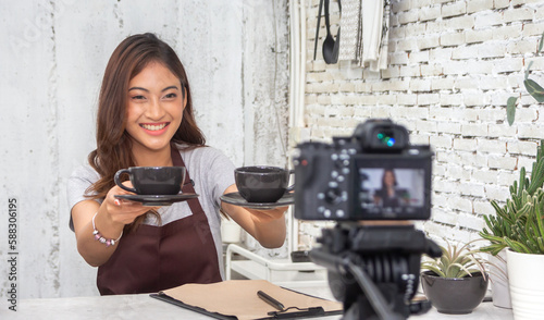 Portrait of smiling beauty asian woman posing look at camera making live selfie, content, vlogger, blogger, live video streaming, broadcast, podcast, online influencer and creator on at cafe