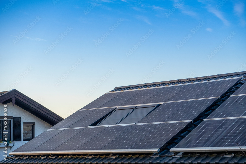 Germany, Bavaria, House roof covered in solar panels Germany, Bavaria, House roof covered in solar panels