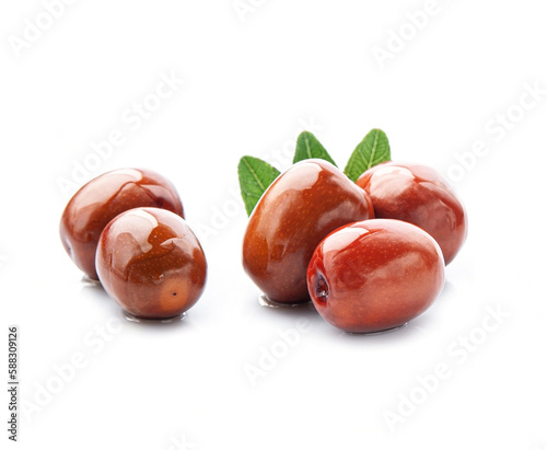 Jojoba fruits with jojoba oil on white backgrounds