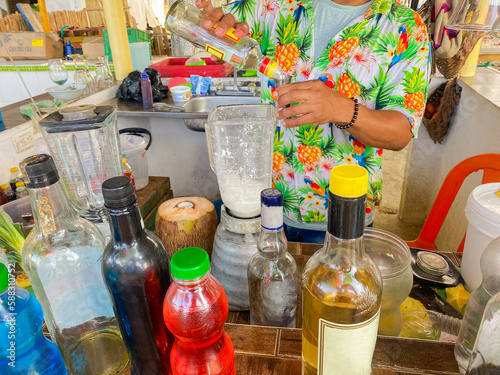 Man preparing a Caribbean cocktail photo