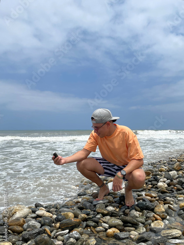 Man enjoying the sea on a sunny day photo