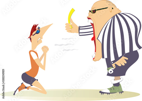 Angry referee holding a yellow card. Kneeling sportsman.
Angry referee shows a yellow card tо the player staying on the knees.
