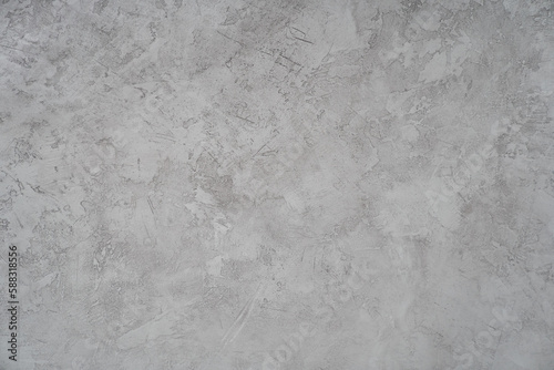 Grey marble stone of rough texture. Overlay for your design with space to copy. Grey texture of concrete, stone wall. Cracks and scratchers. High quality photo