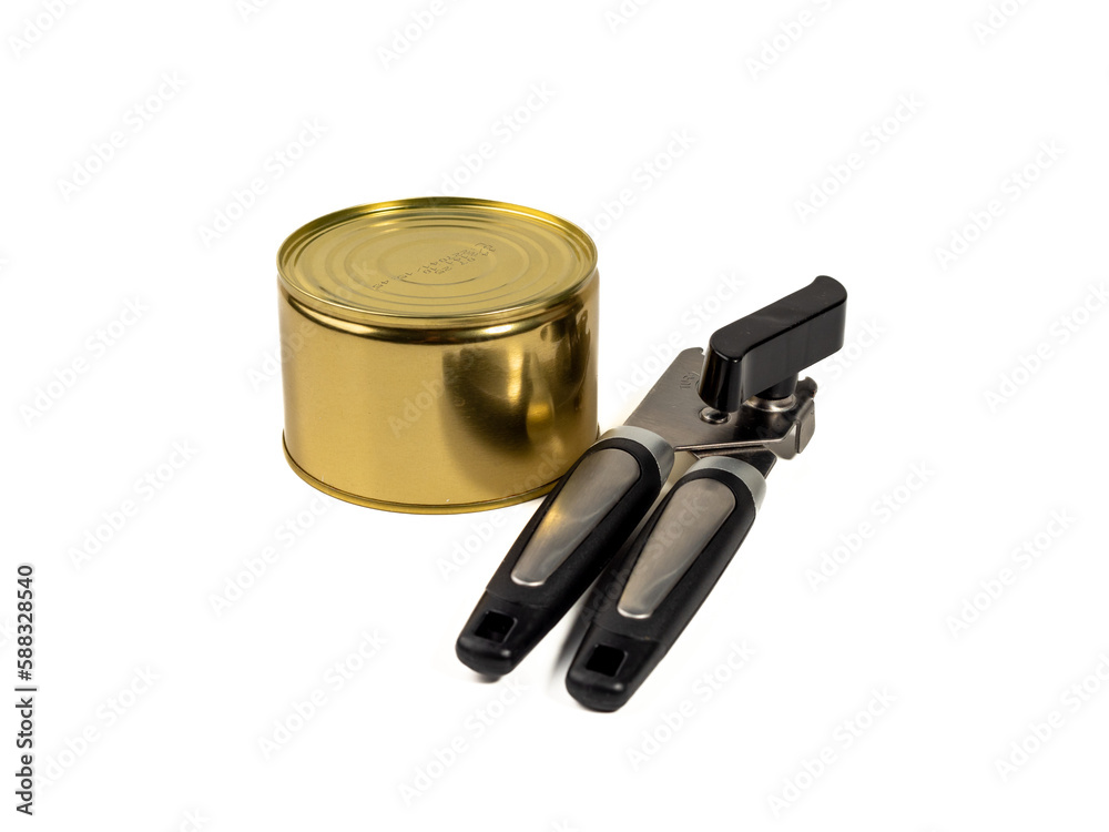 Can opener with tin can isolated on white background. Metal can opener. Close-up. Can opener with tin can isolated on white background. Metal can opener. Close-up.