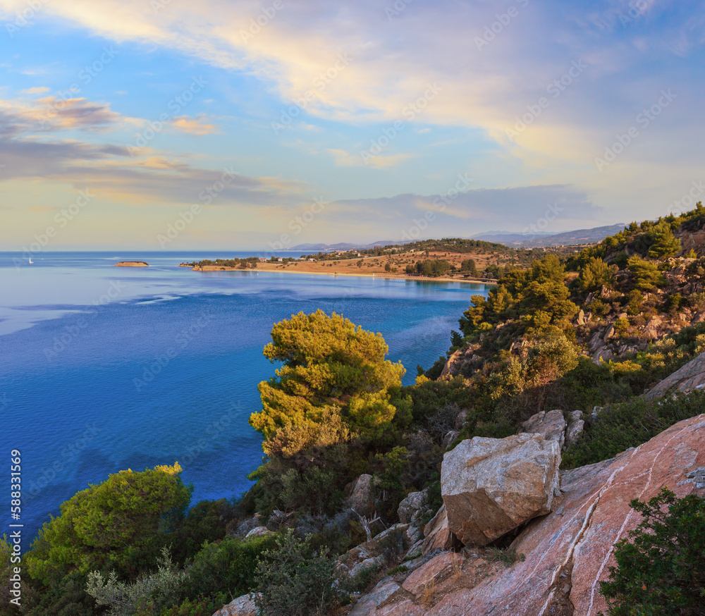 Dusk Aegean Sea coastline and Kastri beach. Summer top view (Nikiti, Sithonia, Halkidiki, Greece). Dusk Aegean Sea coastline and Kastri beach. Summer top view (Nikiti, Sithonia, Halkidiki, Greece).