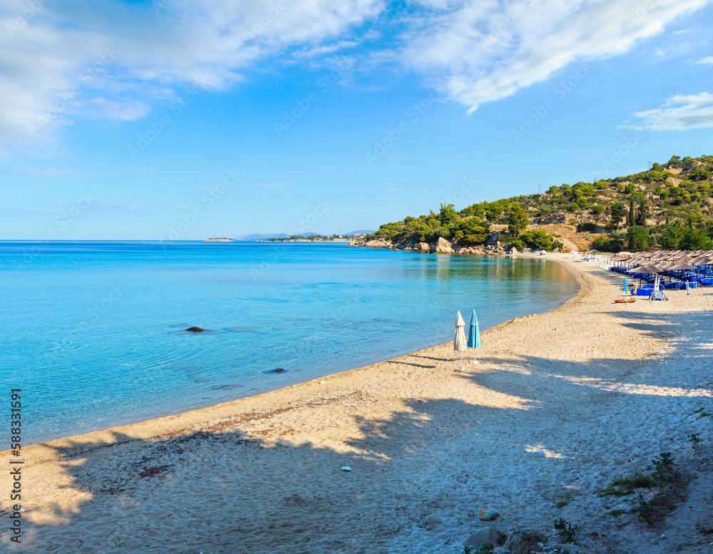 Morning sandy Kaviou beach. Summer top view (Nikiti, Sithonia, Halkidiki, Greece). People unrecognizable.