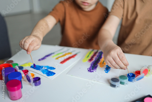 Children draw with paints, lesson in art school