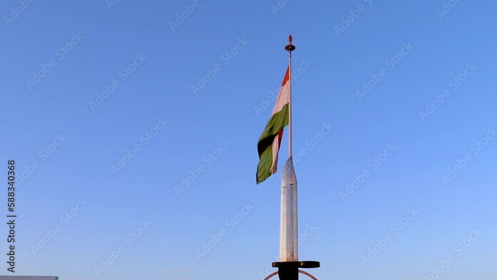 indian army unit insignia with national flag from unique perspective at evening