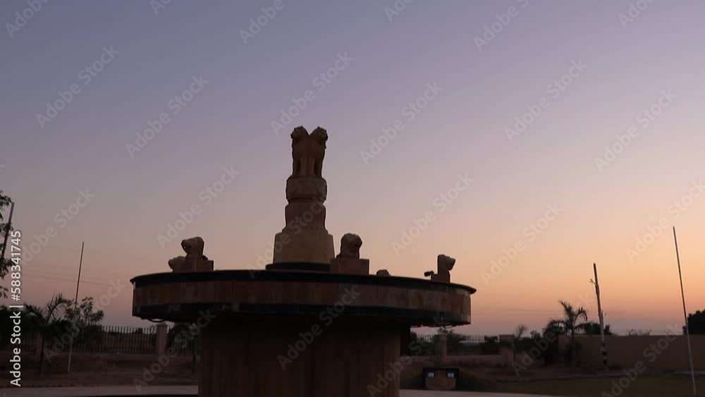 indian national emblem with bright dramatic sky at evening from different angle indian national emblem with bright dramatic sky at evening from different angle