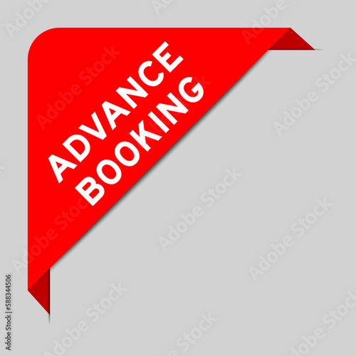 Red color of corner label banner with word advance booking on gray background