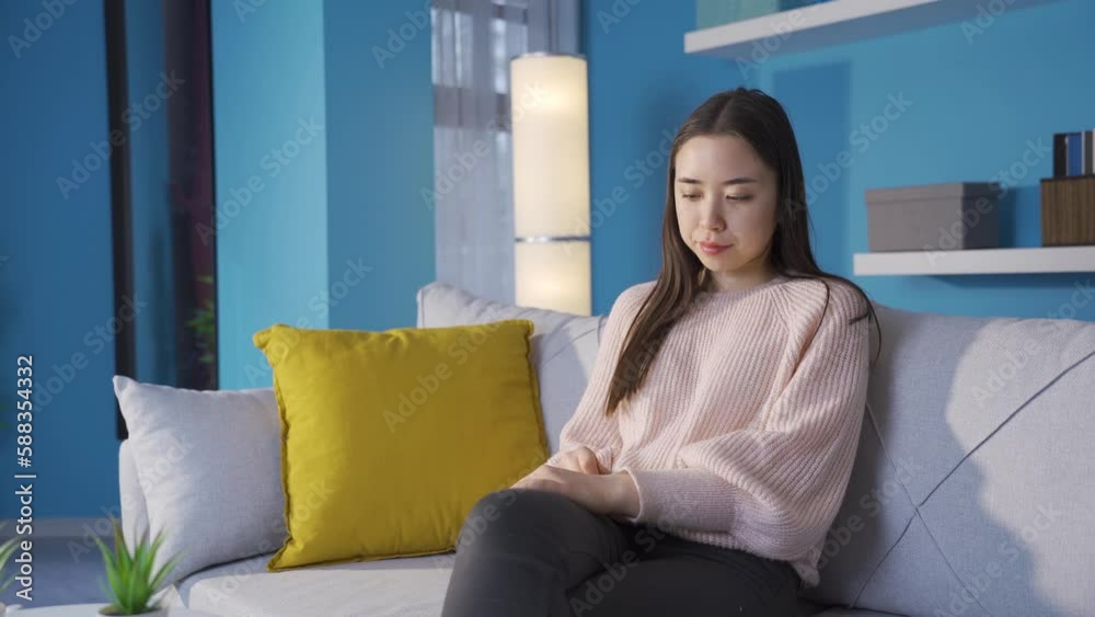 Thoughtful Asian young woman unhappy at home.
Asian young woman thinking alone at home.
Thoughtful Asian young woman unhappy at home.
Asian young woman thinking alone at home.