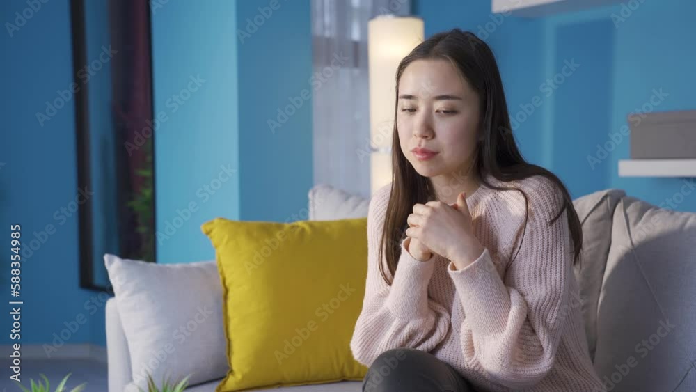 Worried and nervous Asian young woman thoughtful.
Young Asian woman alone at home thinking, worrying and stressing.
Worried and nervous Asian young woman thoughtful.
Young Asian woman alone at home thinking, worrying and stressing.