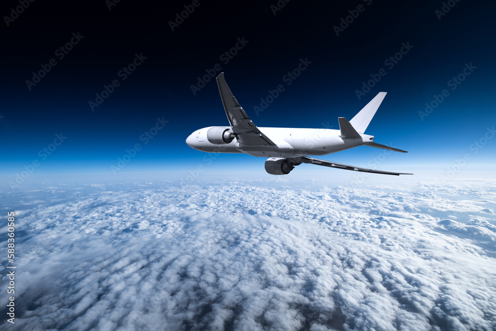 Obraz premium Boeing 777 über Wolkendecke 