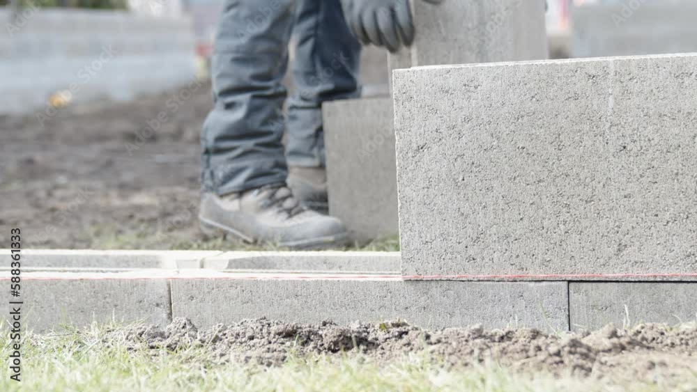 construction of a building made of concrete bricks