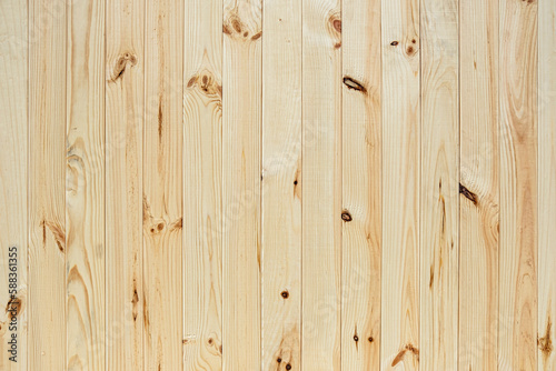 Texture of fresh, narrow, vertical wooden boards. Background backdrop for design.