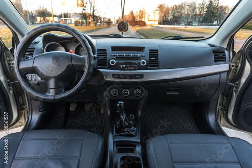 not new car inside instrument panel front seats and rear © yurii oliinyk