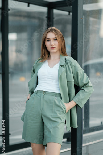 Woman walking down the street in summer clothes. Summer clothes collection. Free Download Woman walking down the street in summer clothes. Summer clothes collection. - GFXLoad
