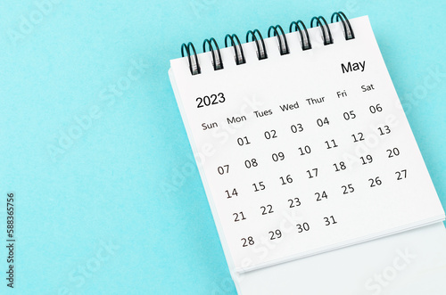 The May 2023 Monthly desk calendar for 2023 year on blue background.