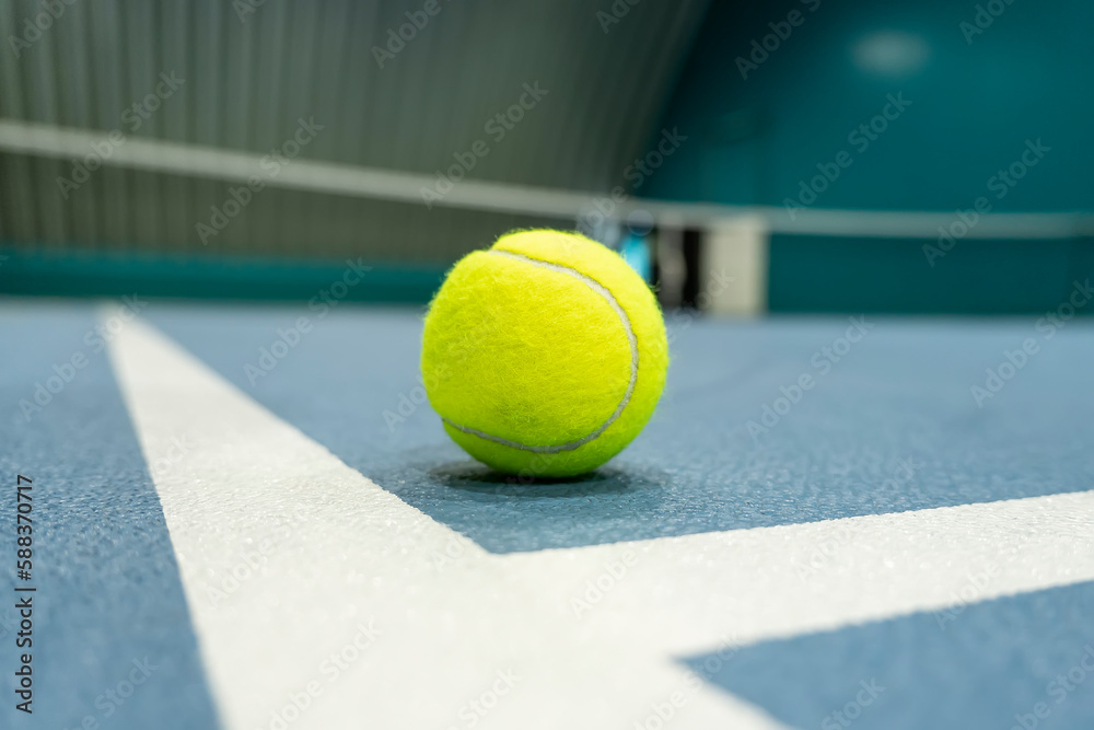 Tennis ball on tennis court. concept of a sporty lifestyle.