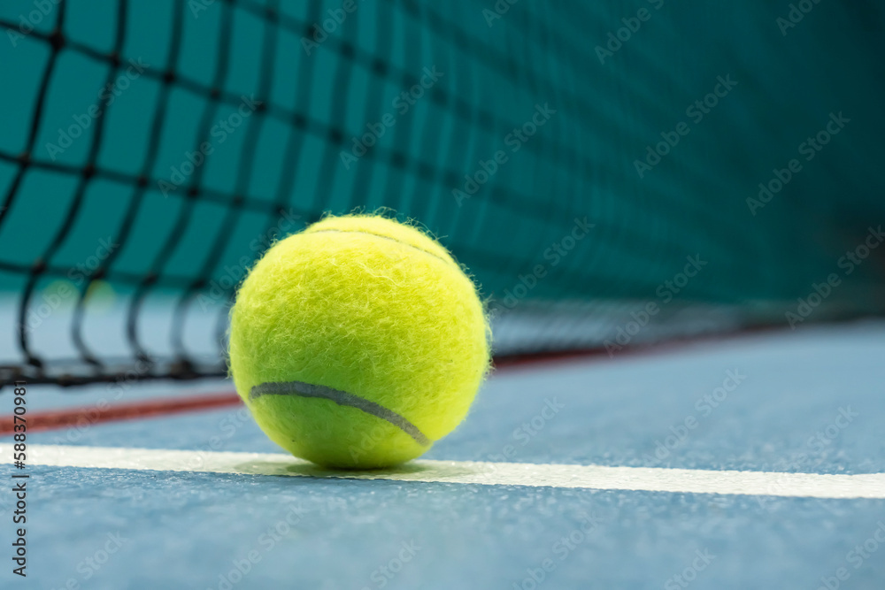 Tennis ball on tennis court. concept of a sporty lifestyle.