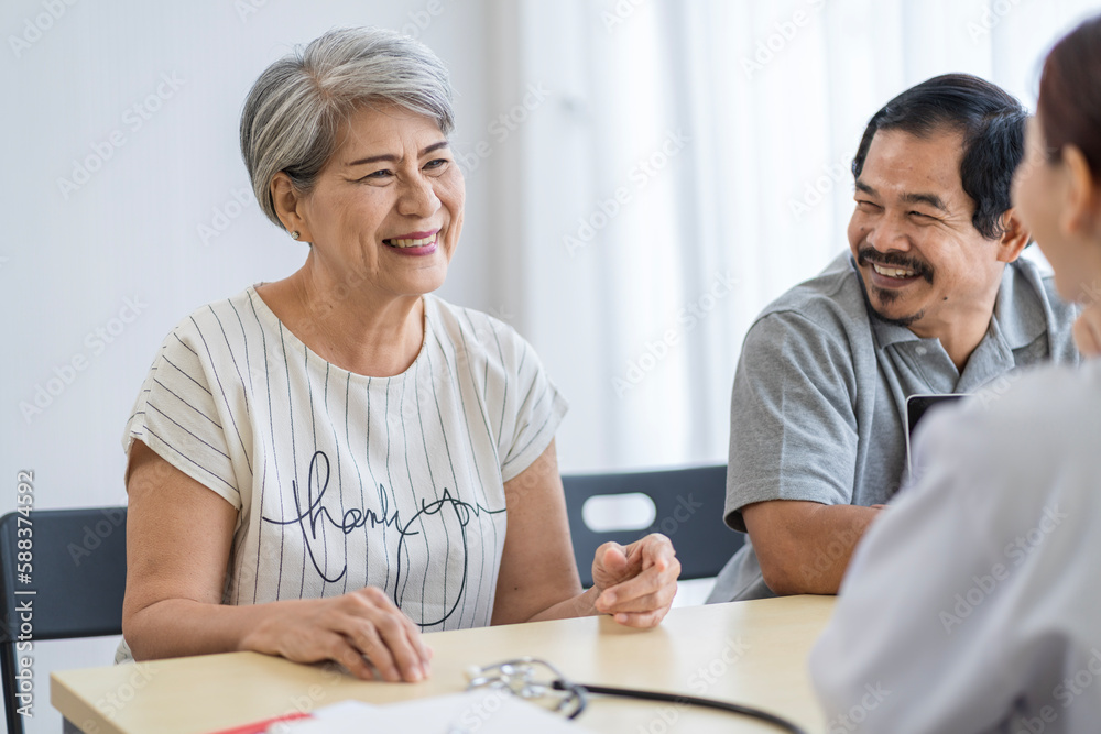 Asian seniors who are healthy, in a good mood, smiling, talking with financial or life insurance staff to take care of life after retirement. Asian seniors who are healthy, in a good mood, smiling, talking with financial or life insurance staff to take care of life after retirement.
