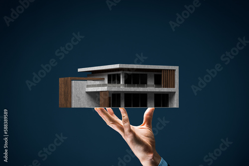 Real estate agent with modern villa house