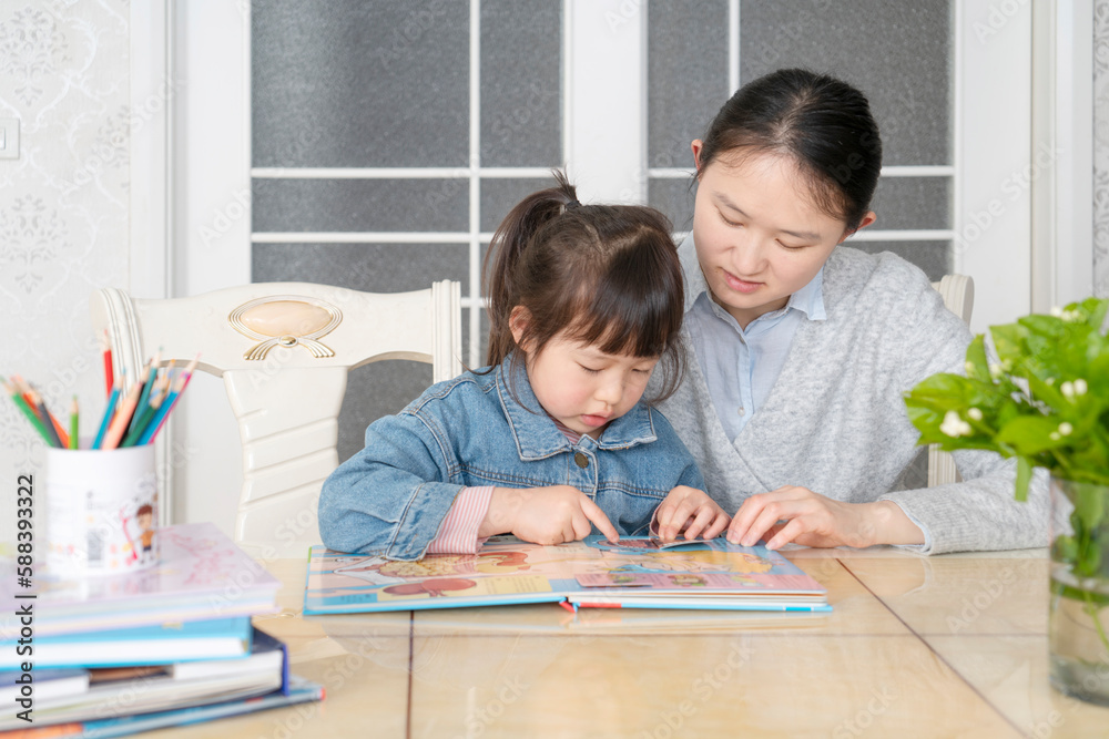 Mom and daughter learn online classes together Mom and daughter learn online classes together