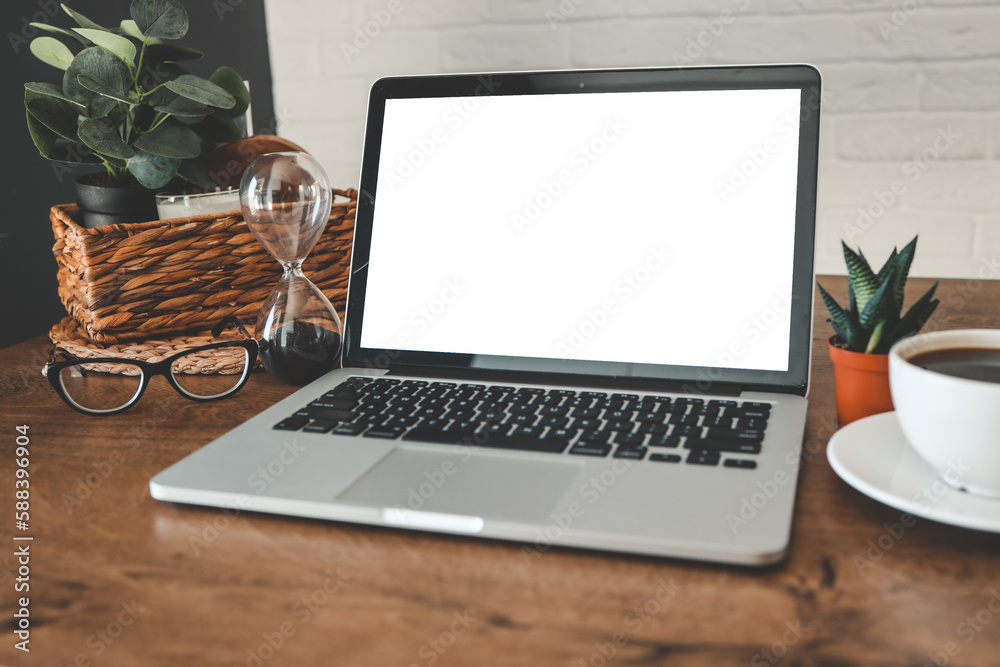 Fototapeta premium Laptop with isolated screen in home working environment