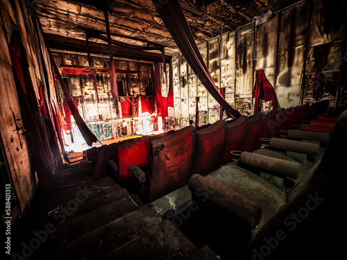 Abandoned and burned cinema hall in an old multiplex cinema