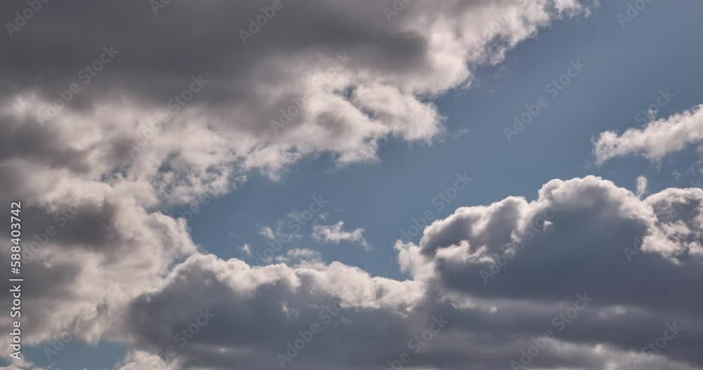 4k timelapse iridescent different layers of clouds in blue sky with glare from sun rays 4k timelapse iridescent different layers of clouds in blue sky with glare from sun rays