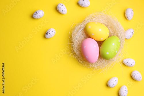 Easter eggs on a colored background, festive background 
