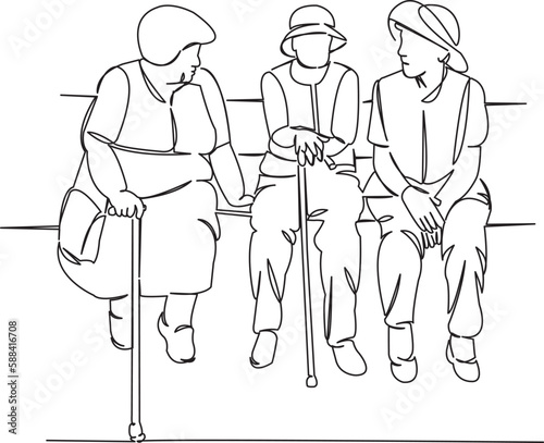 three elderly women sitting on a bench