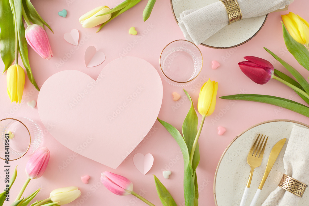 Mother's Day concept. Top view photo of pink hearts circle plates cutlery knife fork fabric napkin with gold ring empty glasses and tulips  on pastel pink background with blank space