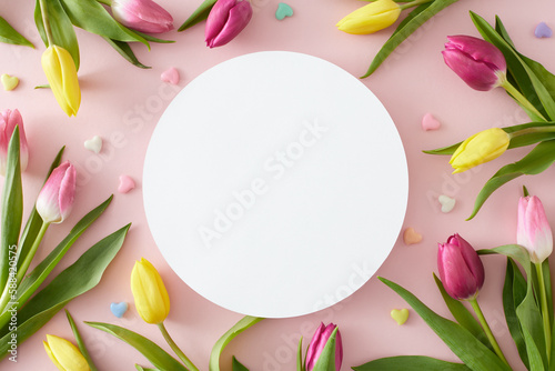 Fototapeta Naklejka Na Ścianę i Meble -  Top view photo of white circle yellow pink tulips flowers and colorful hearts on isolated pastel pink background with blank space. Mother's Day mood concept