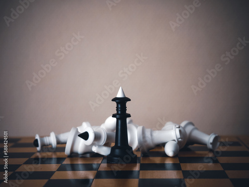 Chess game. Chess pieces on the game board. White and black. Tactical competition. Concept of a successful team work leader. Business strategy.