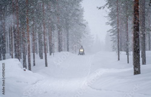 Snowmobile driving in snowstorm