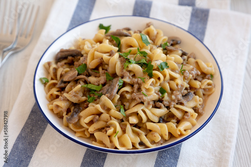 Homemade One Skillet Ground Beef Stroganoff with Mushrooms and Noodles on a Plate, side view.