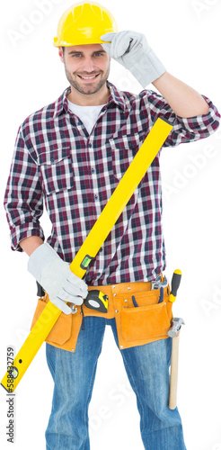 Confident handyman holding spirit level © vectorfusionart