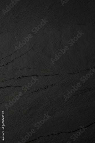 Dark grey black slate background. Black stone texture. Slate background