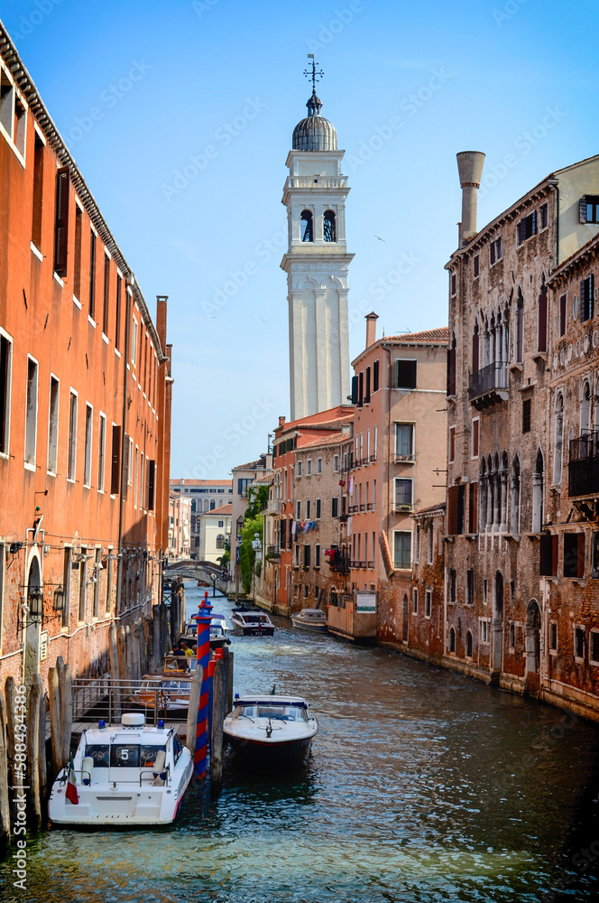 Architecture of the oldest city in Italy with canals and boats