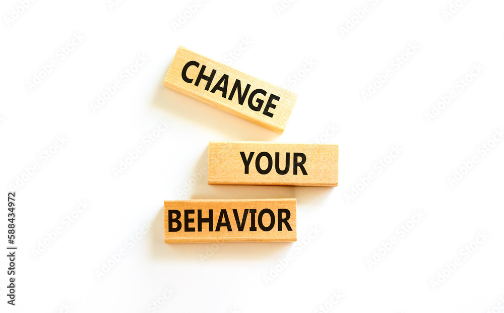 Motivation and Change your behavior symbol. Concept words Change your behavior on wooden block on a beautiful white table white background. Business change your behavior concept. Copy space. Motivation and Change your behavior symbol. Concept words Change your behavior on wooden block on a beautiful white table white background. Business change your behavior concept. Copy space.