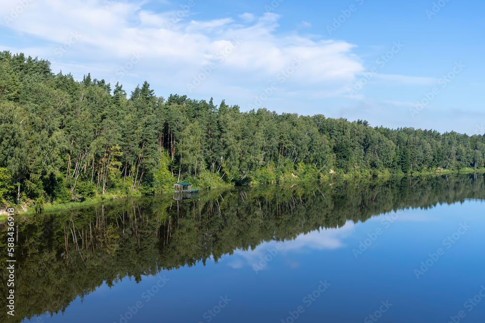 Wide river in summer in sunny weather