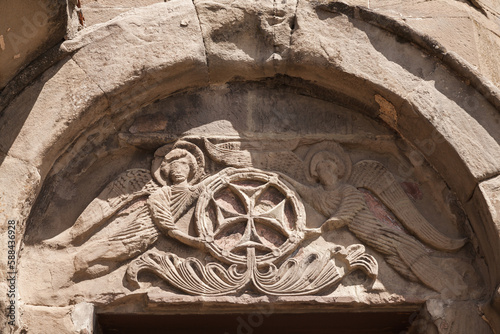Stone carvings with cross. Exterior details of Jvari Monastery. Georgia photo