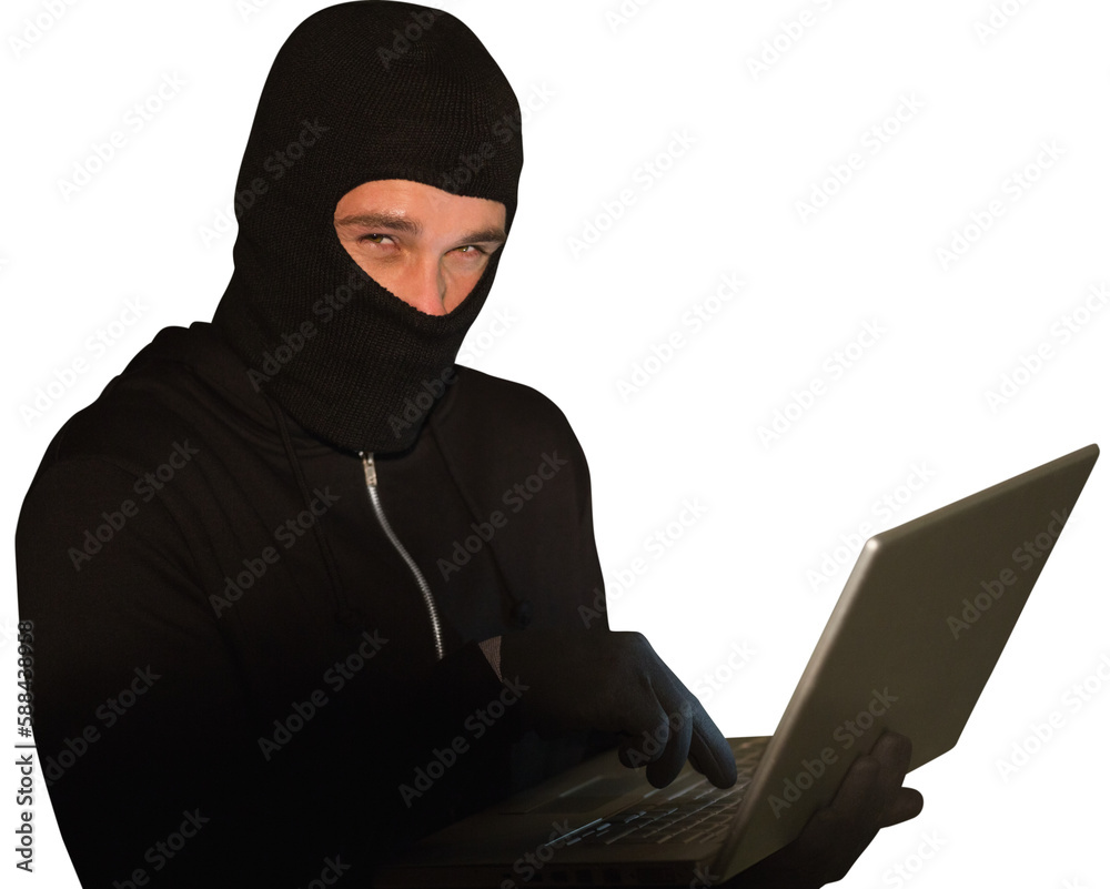 Hacker using laptop to steal identity Hacker using laptop to steal identity